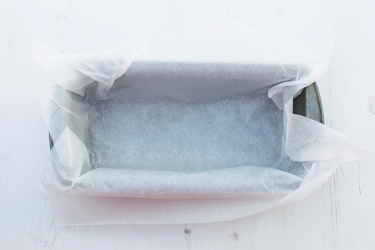 A loaf tin lined with greaseproof paper