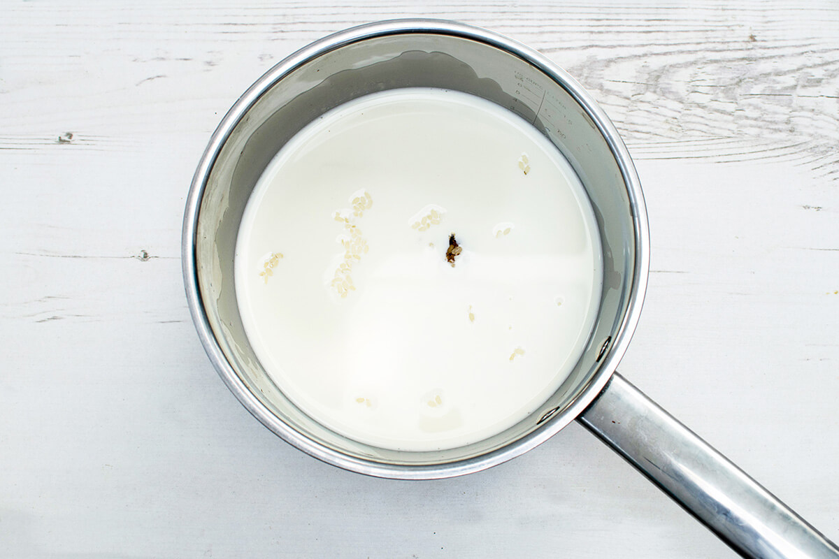 A saucepan of rice, milk and vanilla